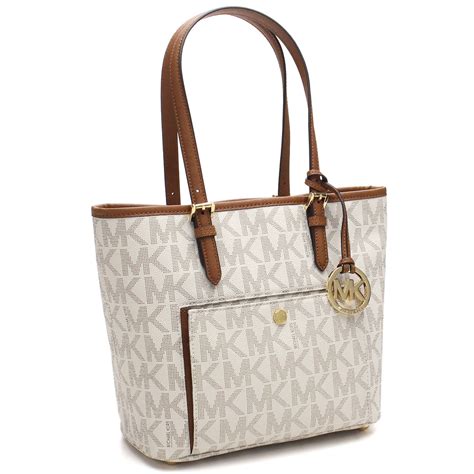 white and tan michael kors purse